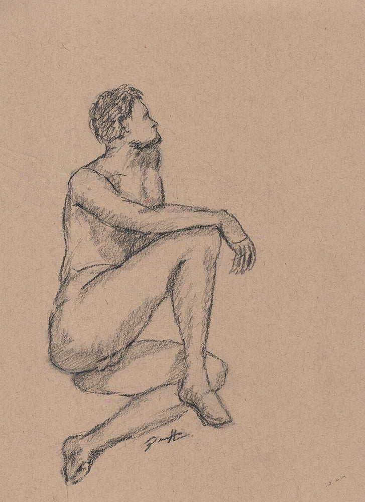 One of a kind original on toned paper of a nude male figure drawing from a live model using black charcoal. The male is seated on the floor with legs crossed.