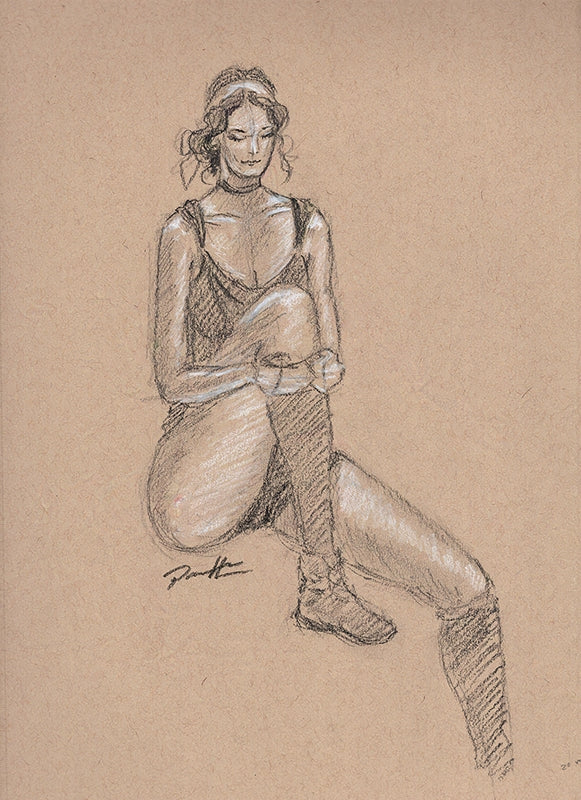 Black and white charcoal sketch on toned paper of a female figure drawn from a live model. The woman is seated with one leg bent stretching.